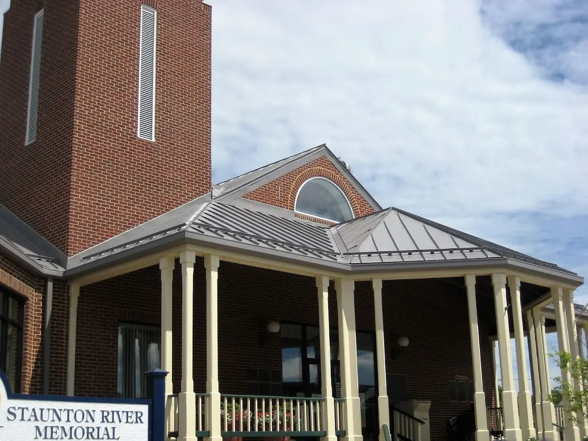 Skilled roofing craftsmen working on a residential roof in Oakville